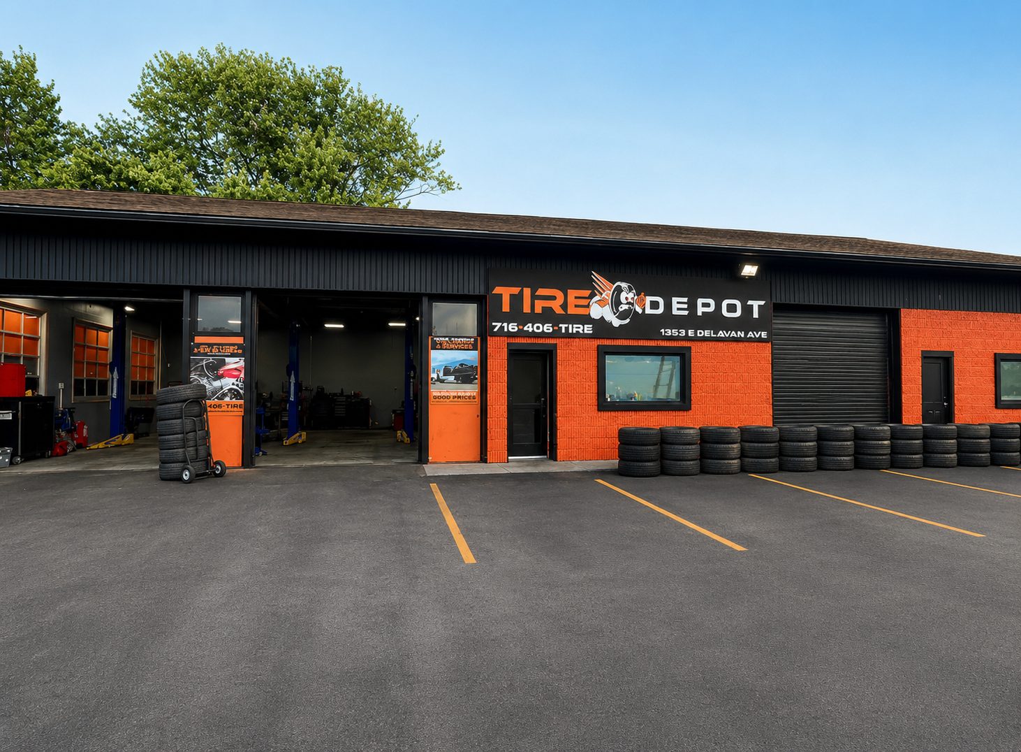 Tire Depot & Auto shop exterior with multiple service bays and tire stock in Buffalo, NY